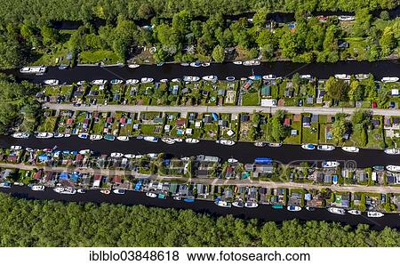 "Aerial view, Boomhoek Loosdrecht, boat parking, Briljant Bungalow, Loosdrecht, Province of North-Holland, Netherlands" View Large Photo Image Stock Photo - "Aerial view, Boomhoek Loosdrecht, boat parking, Briljant Bungalow, Loosdrecht, Province of North-Holland, Netherlands". Fotosearch