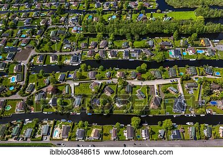 Stock Photography - "Aerial view, Boomhoek Loosdrecht, boat parking, Briljant Bungalow, Loosdrecht, Province of North-Holland, Netherlands". Fotosearch