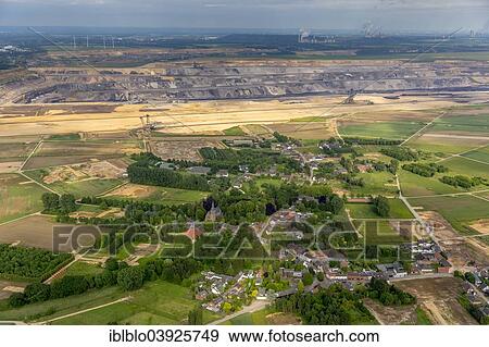 "Aerial view, Borschmich district, abandoned district of Erkelenz on the edge of the Garzweiler surface mine, Lower Rhine, North Rhine-Westphalia, Germany, Europe" View Large Photo Image Stock Photo - "Aerial view, Borschmich district, abandoned district of Erkelenz on the edge of the Garzweiler surface mine, Lower Rhine, North Rhine-Westphalia, Germany, Europe". Fotosearch