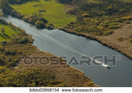 "Aerial view, branch canal from Kleine Muritz Lake to Sumpfsee Lake with the Martin Winkel campsite, Mecklenburg Lake District, Rechlin, Mecklenburg-Western Pomerania, Germany, Europe" View Large Photo Image Picture - "Aerial view, branch canal from Kleine Muritz Lake to Sumpfsee Lake with the Martin Winkel campsite, Mecklenburg Lake District, Rechlin, Mecklenburg-Western Pomerania, Germany, Europe". Fotosearch