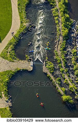 "Aerial view, canoeing on the whitewater course at the Lenne river, Hohenlimburg, Hagen, Ruhr district, North Rhine-Westphalia, Germany, Europe" View Large Photo Image Stock Photo - "Aerial view, canoeing on the whitewater course at the Lenne river, Hohenlimburg, Hagen, Ruhr district, North Rhine-Westphalia, Germany, Europe". Fotosearch