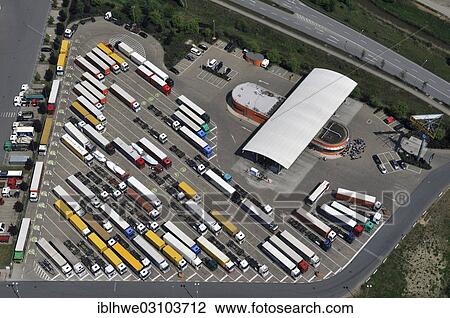 Stock Image - "Aerial view, car park for trucks during Sunday rest, Tankpark Moorfleet, Hamburg, Hamburg, Hamburg, Germany, Europe". Fotosearch