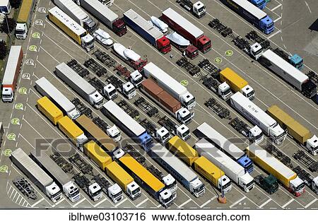 Stock Photograph - "Aerial view, car park for trucks during Sunday rest, Tankpark Moorfleet, Hamburg, Hamburg, Hamburg, Germany, Europe". Fotosearch