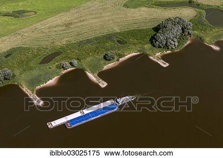 "Aerial view, cargo ship, river vessel on the Elbe River, groynes, Hitzacker, Luchow-Dannenberg, Lower Saxony, Germany, Europe" View Large Photo Image Stock Photography - "Aerial view, cargo ship, river vessel on the Elbe River, groynes, Hitzacker, Luchow-Dannenberg, Lower Saxony, Germany, Europe". Fotosearch
