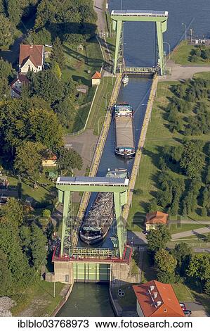 "Aerial view, cargo ships at Dorsten lock, Wesel–Datteln Canal, Dorsten, North Rhine-Westphalia, Germany, Europe" View Large Photo Image Stock Image - "Aerial view, cargo ships at Dorsten lock, Wesel–Datteln Canal, Dorsten, North Rhine-Westphalia, Germany, Europe". Fotosearch