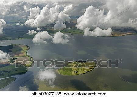 "Aerial view, clouds, Liebitz Island Nature Reserve near Ummanz on the island of Ruegen, Heuwiese, Ummanz, Mecklenburg-Western Pomerania, Germany, Europe" View Large Photo Image Stock Photography - "Aerial view, clouds, Liebitz Island Nature Reserve near Ummanz on the island of Ruegen, Heuwiese, Ummanz, Mecklenburg-Western Pomerania, Germany, Europe". Fotosearch
