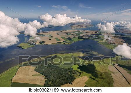 "Aerial view, clouds, Ummanz on the island of Ruegen, Waase, Ummanz, Mecklenburg-Western Pomerania, Germany, Europe" View Large Photo Image Stock Photo - "Aerial view, clouds, Ummanz on the island of Ruegen, Waase, Ummanz, Mecklenburg-Western Pomerania, Germany, Europe". Fotosearch