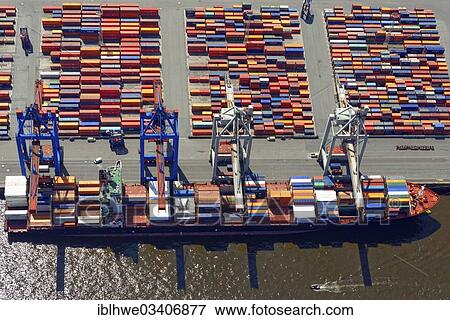 "Aerial view, container ship at Athabaskakai, HHLA Container Terminal Waltershof, Hamburg, Hamburg, Germany, Europe" View Large Photo Image Stock Photo - "Aerial view, container ship at Athabaskakai, HHLA Container Terminal Waltershof, Hamburg, Hamburg, Germany, Europe". Fotosearch