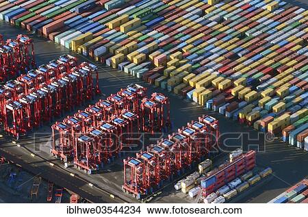"Aerial view, container Terminal, straddle carriers, van carriers or gantry lifts, cargo handling equipment for ISO containers, Hamburg, Hamburg, Germany, Europe" View Large Photo Image Picture - "Aerial view, container Terminal, straddle carriers, van carriers or gantry lifts, cargo handling equipment for ISO containers, Hamburg, Hamburg, Germany, Europe". Fotosearch
