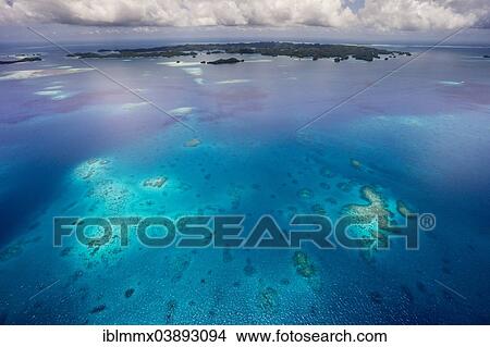 Picture - "Aerial view, coral reef, Pacific Ocean, Palau, Oceania". Fotosearch
