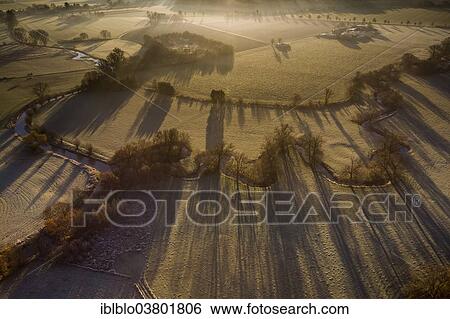Stock Photograph - "Aerial view, course of the Ahse river with meanders, renaturation, Hamm, Ruhr area, North Rhine-Westphalia, Germany, Europe". Fotosearch