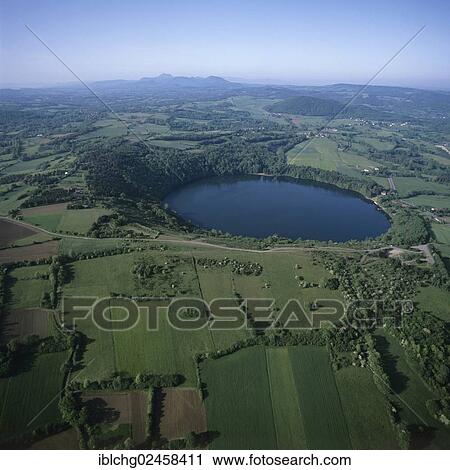 "Aerial view, crater lake of Gour de Tazenat, Auvergne Parc Naturel Regional des Volcans d'Auvergne, Natural regional park of Volcans d'Auvergne, Puy de Dome, Auvergne, France, Europe" View Large Photo Image Stock Image - "Aerial view, crater lake of Gour de Tazenat, Auvergne Parc Naturel Regional des Volcans d'Auvergne, Natural regional park of Volcans d'Auvergne, Puy de Dome, Auvergne, France, Europe". Fotosearch