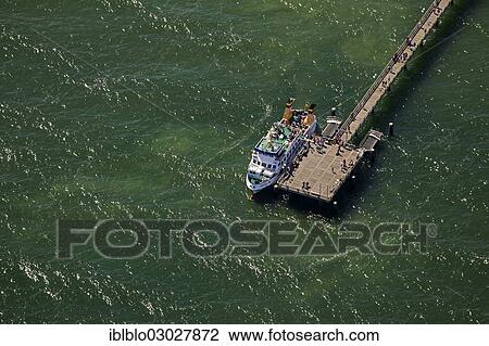 "Aerial view, cruise ship and wharf in Binz on the island of Ruegen, Ostseebad, Binz, Mecklenburg-Western Pomerania, Germany, Europe" View Large Photo Image Stock Image - "Aerial view, cruise ship and wharf in Binz on the island of Ruegen, Ostseebad, Binz, Mecklenburg-Western Pomerania, Germany, Europe". Fotosearch