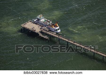 "Aerial view, cruise ship and wharf in Binz on the island of Ruegen, Ostseebad, Binz, Mecklenburg-Western Pomerania, Germany, Europe" View Large Photo Image Stock Photo - "Aerial view, cruise ship and wharf in Binz on the island of Ruegen, Ostseebad, Binz, Mecklenburg-Western Pomerania, Germany, Europe". Fotosearch