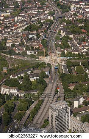 "Aerial view, demolition works of a bridge on the A40 motorway at Hohenburgstrasse street, full motorway closure, Essen, Ruhr Area, North Rhine-Westphalia, Germany, Europe" View Large Photo Image Stock Photo - "Aerial view, demolition works of a bridge on the A40 motorway at Hohenburgstrasse street, full motorway closure, Essen, Ruhr Area, North Rhine-Westphalia, Germany, Europe". Fotosearch