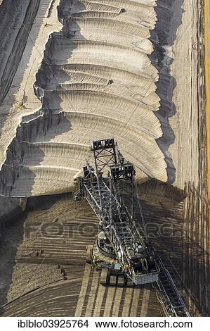 "Aerial view, diggers in the Garzweiler surface mine, RWE Rheinbraun, Juchen, Lower Rhine, North Rhine-Westphalia, Germany, Europe" View Large Photo Image Picture - "Aerial view, diggers in the Garzweiler surface mine, RWE Rheinbraun, Juchen, Lower Rhine, North Rhine-Westphalia, Germany, Europe". Fotosearch