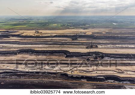 "Aerial view, diggers in the Garzweiler surface mine, RWE Rheinbraun, Juchen, Lower Rhine, North Rhine-Westphalia, Germany, Europe" View Large Photo Image Picture - "Aerial view, diggers in the Garzweiler surface mine, RWE Rheinbraun, Juchen, Lower Rhine, North Rhine-Westphalia, Germany, Europe". Fotosearch