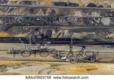 "Aerial view, diggers in the Garzweiler surface mine, RWE Rheinbraun, Erkelenz, Lower Rhine, North Rhine-Westphalia, Germany, Europe" View Large Photo Image Stock Photo - "Aerial view, diggers in the Garzweiler surface mine, RWE Rheinbraun, Erkelenz, Lower Rhine, North Rhine-Westphalia, Germany, Europe". Fotosearch