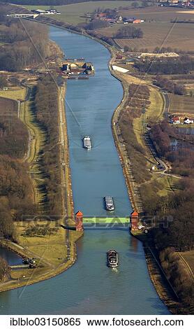 "Aerial view, Dortmund-Ems Canal, barges, cargo ships, Lippe Bridge, Datteln, Ruhr district, North Rhine-Westphalia, Germany, Europe" View Large Photo Image Stock Photography - "Aerial view, Dortmund-Ems Canal, barges, cargo ships, Lippe Bridge, Datteln, Ruhr district, North Rhine-Westphalia, Germany, Europe". Fotosearch