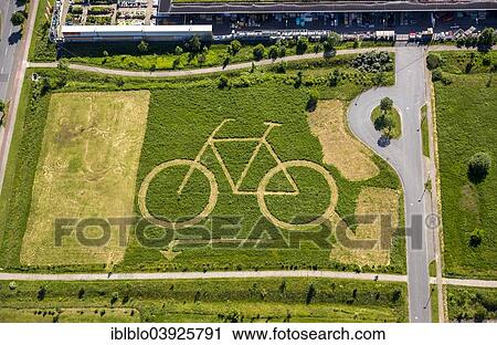 "Aerial view, Eco-Center NRW with a big bike mowed into a field, Hamm, Ruhr district, North Rhine-Westphalia, Germany, Europe" View Large Photo Image Stock Image - "Aerial view, Eco-Center NRW with a big bike mowed into a field, Hamm, Ruhr district, North Rhine-Westphalia, Germany, Europe". Fotosearch