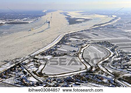 "Aerial view, Elbe dredging project, Elbe and Luehe rivers at Gruenendeich, in winter, Grunendeich, Altes Land, Lower Saxony, Germany, Europe" View Large Photo Image Stock Photo - "Aerial view, Elbe dredging project, Elbe and Luehe rivers at Gruenendeich, in winter, Grunendeich, Altes Land, Lower Saxony, Germany, Europe". Fotosearch