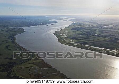 Stock Photo - "Aerial view, Elbe River at Brunsbuettel, Brunsbuttel, Schleswig-Holstein, Germany, Europe". Fotosearch