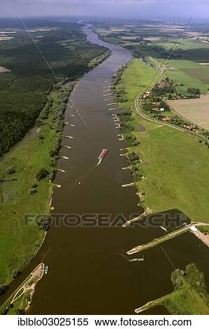 Stock Photography - "Aerial view, Elbe River with cargo ship, river vessel, Hitzacker, Landkreis Luchow-Dannenberg, Lower Saxony, Germany, Europe". Fotosearch