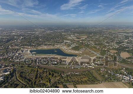 Stock Image - "Aerial view, Emscher river, Lake PhoenixSee, Dortmund, Ruhr area, North Rhine-Westphalia, Germany, Europe". Fotosearch