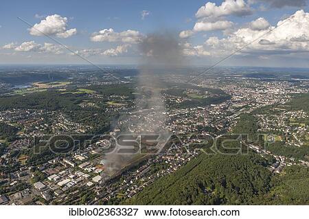 "Aerial view, fire and heavy smoke, An der Kohlenbahn street, Hagen, Sauerland region, North Rhine-Westphalia, Germany, Europe" View Large Photo Image Stock Photo - "Aerial view, fire and heavy smoke, An der Kohlenbahn street, Hagen, Sauerland region, North Rhine-Westphalia, Germany, Europe". Fotosearch