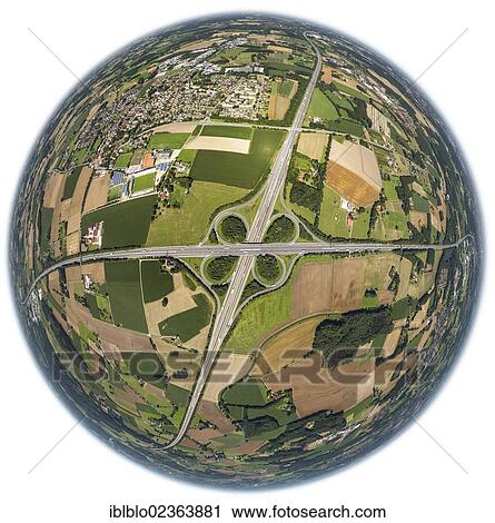 Stock Image - "Aerial view, fisheye lens, Lotte Osnabrueck motorway intersection, the motorways A1, A30, E30, E37, Lower Saxony, Germany, Europe". Fotosearch