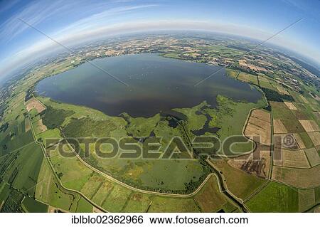 Stock Photograph - "Aerial view, fisheye shot, Duemmer river and Duemmersee lake, North German Plain or Northern Lowland, Hunte, Bohmte, Lower Saxony, Germany, Europe". Fotosearch