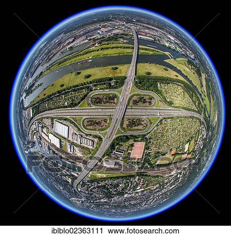 Stock Image - "Aerial view, fisheye shot, motorway junction A40 and A59, Duisburg, North Rhine-Westphalia, Germany, Europe". Fotosearch