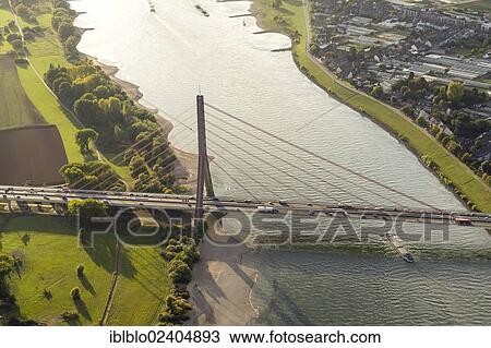 "Aerial view, Fleher bridge across the Rhine river, Duesseldorf, Rhineland region, North Rhine-Westphalia, Germany, Europe" View Large Photo Image Stock Image - "Aerial view, Fleher bridge across the Rhine river, Duesseldorf, Rhineland region, North Rhine-Westphalia, Germany, Europe". Fotosearch