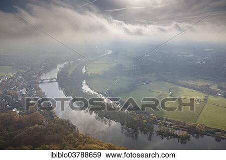 "Aerial view, floodplains of the Ruhr River with autumnal clouds, morning fog, Mulheim an der Ruhr, Ruhr area, North Rhine-Westphalia, Germany, Europe" View Large Photo Image Stock Photo - "Aerial view, floodplains of the Ruhr River with autumnal clouds, morning fog, Mulheim an der Ruhr, Ruhr area, North Rhine-Westphalia, Germany, Europe". Fotosearch
