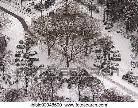 "Aerial view, Garden Cemetery, cremation graves under the trees in winter, Stadtbezirke I, Essen, North Rhine-Westphalia, Germany, Europe" View Large Photo Image Stock Image - "Aerial view, Garden Cemetery, cremation graves under the trees in winter, Stadtbezirke I, Essen, North Rhine-Westphalia, Germany, Europe". Fotosearch