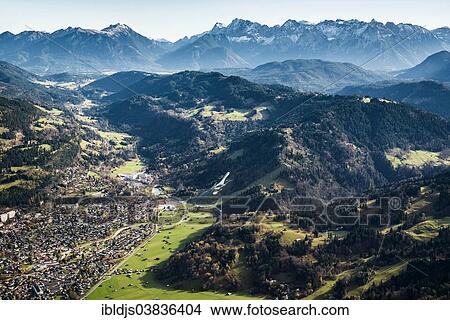 Picture - "Aerial view, Garmisch-Partenkirchen and the Wetterstein mountain range, Upper Bavaria, Bavaria, Germany, Europe". Fotosearch