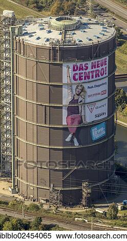 "Aerial view, Gasometer with advertising for Centro, Oberhausen, Ruhr area, North Rhine-Westphalia, Germany, Europe" View Large Photo Image Stock Photography - "Aerial view, Gasometer with advertising for Centro, Oberhausen, Ruhr area, North Rhine-Westphalia, Germany, Europe". Fotosearch