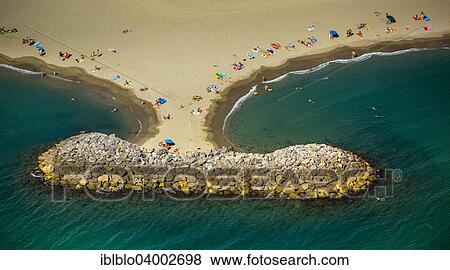 Stock Photo - "Aerial view, groyne and beach life in Canet-en-Roussillon, Departement Pyrenees-Orientales, Sainte-Marie, Languedoc-Roussillon, South of France, France, Europe". Fotosearch
