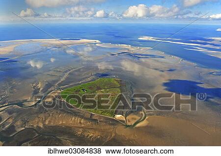 "Aerial view, Hallig Suederoog, small island in the North Frisian Wadden Sea, behind the North Frisian Barrier Islands Suederoogsand, left, and Norderoogsand, right, Suederoog, Schleswig-Holstein, Germany, Europe" View Large Photo Image Stock Photo - "Aerial view, Hallig Suederoog, small island in the North Frisian Wadden Sea, behind the North Frisian Barrier Islands Suederoogsand, left, and Norderoogsand, right, Suederoog, Schleswig-Holstein, Germany, Europe". Fotosearch
