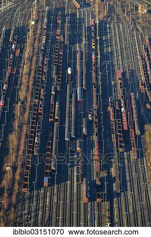 "Aerial view, Hamm freight depot, railway tracks and cars at rail yard, Hamm, North Rhine-Westphalia, Germany, Europe" View Large Photo Image Stock Image - "Aerial view, Hamm freight depot, railway tracks and cars at rail yard, Hamm, North Rhine-Westphalia, Germany, Europe". Fotosearch