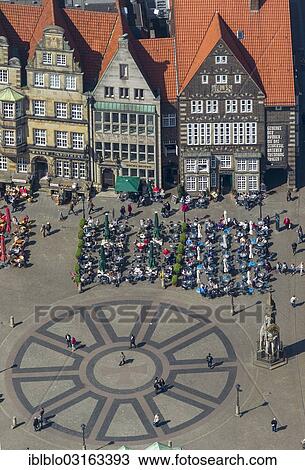 Stock Image - "Aerial view, Hanseatic Cross in front of the Bremen Roland statue at Marktplatz, market square, with the Town Hall and gabled houses, Bremen, Bremen, Germany, Europe". Fotosearch
