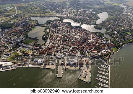 "Aerial view, harbour, marina with the German Oceanographic Museum and the Ozeaneum aquarium, old town island surrounded by water at the sound of Strelasund, Stralsund, Mecklenburg-Western Pomerania, Germany, Europe" View Large Photo Image Stock Image - "Aerial view, harbour, marina with the German Oceanographic Museum and the Ozeaneum aquarium, old town island surrounded by water at the sound of Strelasund, Stralsund, Mecklenburg-Western Pomerania, Germany, Europe". Fotosearch