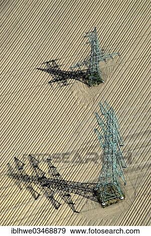 "Aerial view, high-voltage transmission masts in a field, Geesthacht, Schleswig-Holstein, Germany, Europe" View Large Photo Image Stock Photo - "Aerial view, high-voltage transmission masts in a field, Geesthacht, Schleswig-Holstein, Germany, Europe". Fotosearch