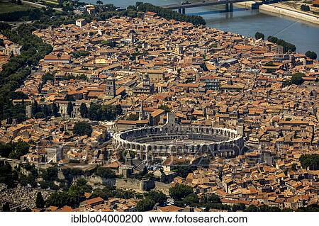 "Aerial view, historic centre of Arles on the Rhone River, city centre with the Arles Amphitheatre, UNESCO World Heritage Site, Arles, Provence-Alpes-Cote d'Azur, France, Europe" View Large Photo Image Stock Image - "Aerial view, historic centre of Arles on the Rhone River, city centre with the Arles Amphitheatre, UNESCO World Heritage Site, Arles, Provence-Alpes-Cote d'Azur, France, Europe". Fotosearch