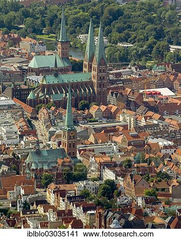 "Aerial view, historic town centre with St. James's Church, St. Mary's Church and St. Peter's Church, Altstadt, Innenstadt, Lubeck, Schleswig-Holstein, Germany, Europe" View Large Photo Image Stock Image - "Aerial view, historic town centre with St. James's Church, St. Mary's Church and St. Peter's Church, Altstadt, Innenstadt, Lubeck, Schleswig-Holstein, Germany, Europe". Fotosearch