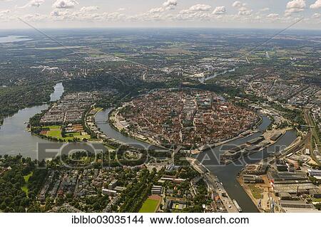 "Aerial view, historic town island, historic center, Lubeck, Schleswig-Holstein, Germany, Europe" View Large Photo Image Picture - "Aerial view, historic town island, historic center, Lubeck, Schleswig-Holstein, Germany, Europe". Fotosearch