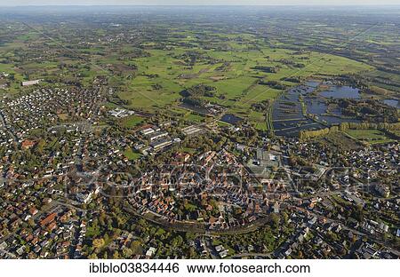 Stock Photograph - "Aerial view, historical town centre with city walls, Rietberg, Ostwestfalen-Lippe Region, North Rhine-Westphalia, Germany, Europe". Fotosearch