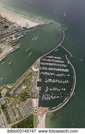 "Aerial view, Hohe Duene marina, Hanse Sail Rostock, Warnemunde, Rostock, Mecklenburg-Western Pomerania, Germany, Europe" View Large Photo Image Stock Photo - "Aerial view, Hohe Duene marina, Hanse Sail Rostock, Warnemunde, Rostock, Mecklenburg-Western Pomerania, Germany, Europe". Fotosearch