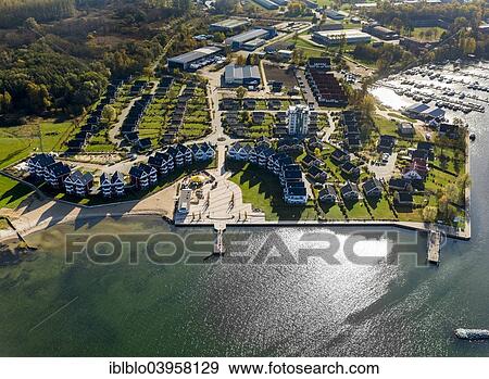 "Aerial view, holiday homes, captains' houses, Rechlin-Nord with harbor village and marina, branch canal to Claassee Lake, Mecklenburg Lake District, Rechlin, Mecklenburg-Western Pomerania, Germany, Europe" View Large Photo Image Stock Photo - "Aerial view, holiday homes, captains' houses, Rechlin-Nord with harbor village and marina, branch canal to Claassee Lake, Mecklenburg Lake District, Rechlin, Mecklenburg-Western Pomerania, Germany, Europe". Fotosearch