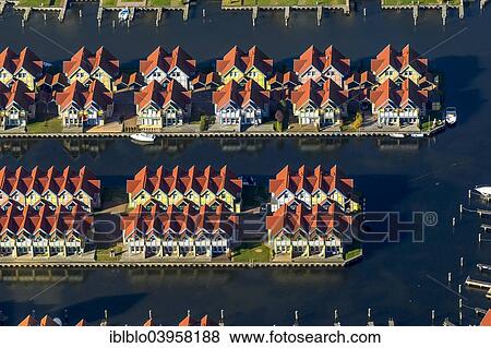 "Aerial view, holiday homes with moorings, Rheinsberg Marina, Rheinsberg Harbour Village, Maritim Hafenhotel Rheinsberg, Grosser Rheinsberger See Lake, Rheinsberg, Mecklenburg Lake District, Brandenburg, Germany, Europe" View Large Photo Image Stock Photo - "Aerial view, holiday homes with moorings, Rheinsberg Marina, Rheinsberg Harbour Village, Maritim Hafenhotel Rheinsberg, Grosser Rheinsberger See Lake, Rheinsberg, Mecklenburg Lake District, Brandenburg, Germany, Europe". Fotosearch